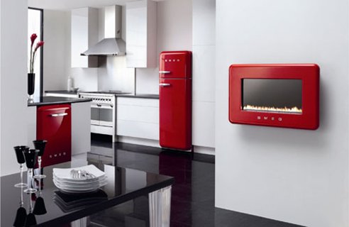 un'elegante cucina bianca e rossa con elettrodomestici rossi e tutto bianco, con un tavolo nero è uno spazio molto luminoso